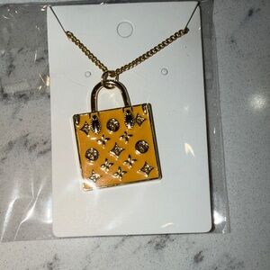 Stainless steel necklace with charm